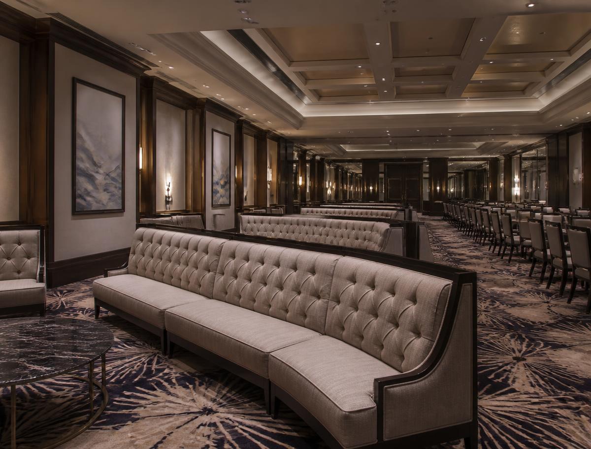 Convention hotel banquet foyer with long runs of upholstered seating